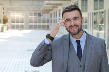 Cute businessman smiling with copy space 