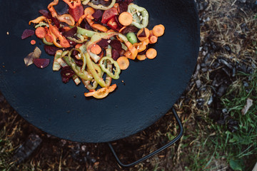 Roasting vegetables in outdoor.