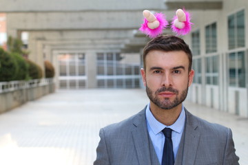 Man wearing a crown with penises