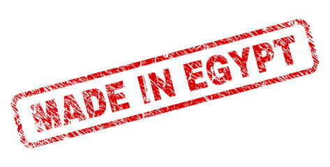 MADE IN EGYPT stamp seal print with scratced style. Red vector rubber print of MADE IN EGYPT title with scratched texture. Text label is placed inside rounded rectangle frame.