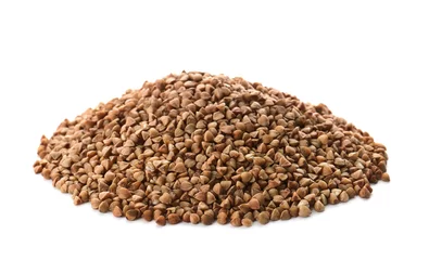 Gordijnen Raw buckwheat on white background. Healthy grains and cereals © New Africa