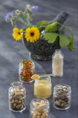 Medicine, Healthcare, Pharmaceuticals, Food supplements and homeopathy,capsules on slate background