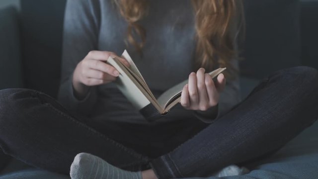 Young girl reading book
