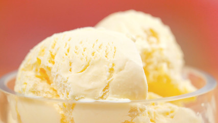 Refreshing summertime vanilla ice cream macro closeup.