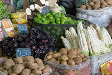 Vegetable market and prices in a Lima market, in Peru.