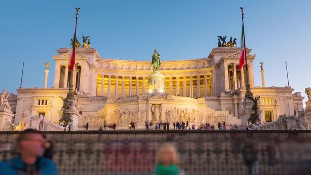 Vittorio Emanuele II Monument aka Altare della Patria zoom in as night falls in Rome, Italy - Timelapse (people blurred for commercial use)