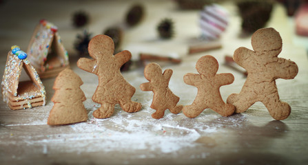 candles and gingerbread men at the Christmas table
