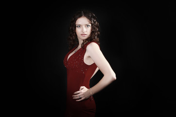 Fototapeta premium beautiful woman in red dress with evening make-up