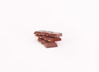milk chocolate with nuts isolated on white.photo with copy space