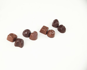 few chocolates isolated on white.photo with copy space