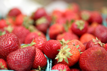 Fresh strawberries at a farmer's market.