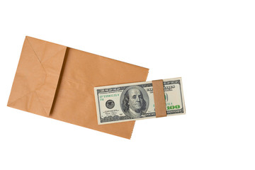 Dollar bills on paper bag, top view. Stack of one hundred paper  currency wrapped in strap laying on flat brown paper bag isolated white background with clipping path.