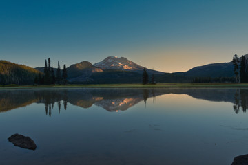Sparks Lake in Central Oregon is a popular destination for outdoor enthusiasts, paddle boarders and kayakers 