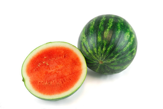 seedless watermelon and cut in half on white background