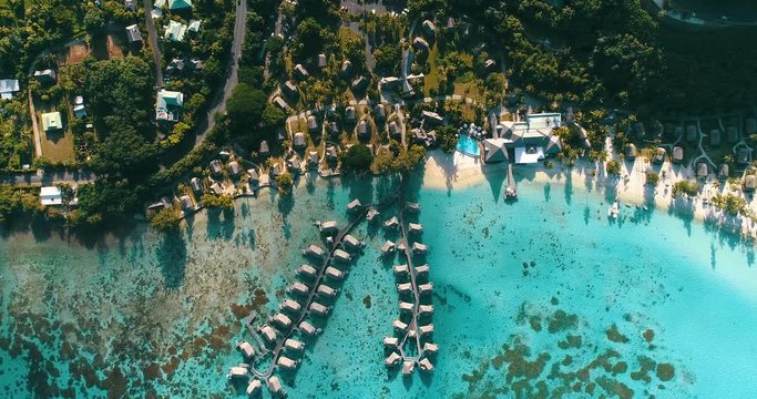 hotel with overwater bungalow in a lagoon in French Polynesia