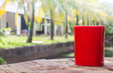 Red  Coffee cup in the garden