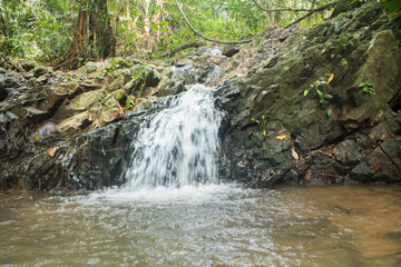 Naklejka na ściany i meble Waterfall Ton Sai in the forest phuket Thailand. Tropical zone Thailand Southern
