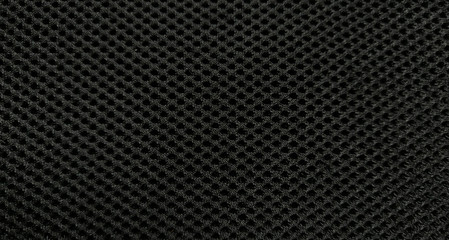Black nylon fabric pattern texture background.