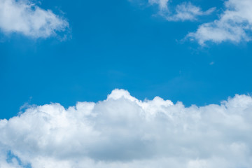 Naklejka na ściany i meble Beautiful blue sky with clouds for background.