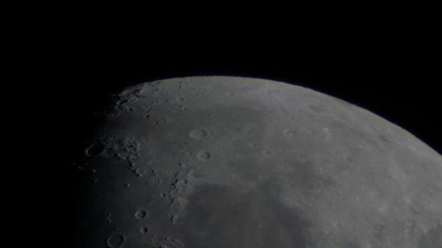 Detail of moon surface trough amateur telescope. Hot air effect.