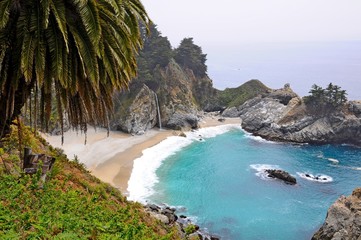Famous waterfall on the beach in Big Sur, California, United States