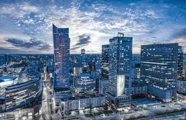 Warsaw city with modern skyscraper at sunset - obrazy, fototapety, plakaty