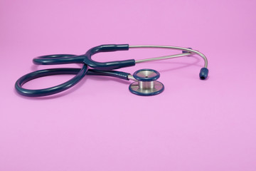 Medical concept. Stethoscope on the pink background.
