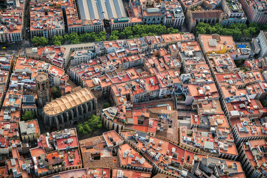 Aerial view of Barcelona Old Town narrow streets and famous La Rambla, Spain