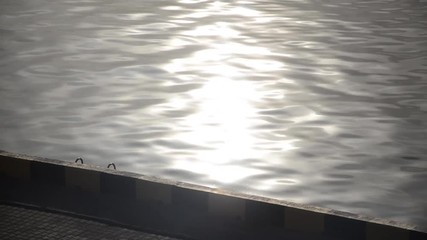The path of the morning sun is reflected in the sea.