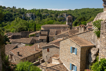 Fototapeta na wymiar View of the rooftops of the old medieval French community Labeaume at the river Ardeche in France