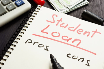 Student loan pros and cons written on a page.