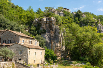 Fototapeta na wymiar View of houses and rocks of the old historical village Labeaume on the river Ardeche in France