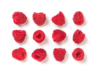 View from above of ripe red raspberry on white background. Organic raspberries creative layout...