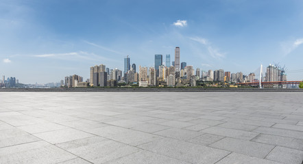 Panoramic skyline and modern business office buildings with empty road,empty concrete square floor