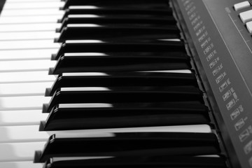 Naklejka premium Piano keyboard of synthesizer close-up