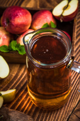 Jug with freshly made pressed apple juice