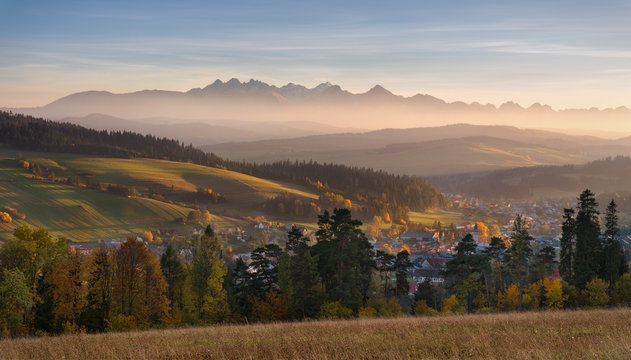 Autumn Landscape Of Poland Tatra Mountains. Beautiful View Of High Tatras And Picturesque Sunny Valley. Polish Rural Landscape With Tatry Mountain At Sunset.