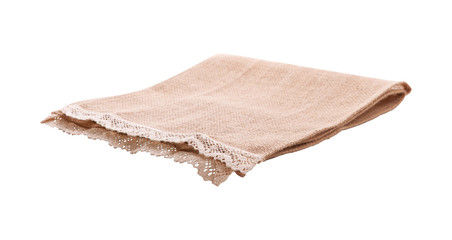 Empty canvas napkin with lace, tablecloth isolated on white background. Can used for display or montage your products. Selective fokus - obrazy, fototapety, plakaty