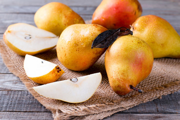 Fresh ripe organic pears on a wooden table