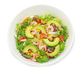 Bowl of tasty salad with ripe avocado on white background