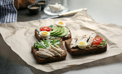 Delicious toasts on table