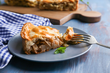 Piece of tasty apple pie on plate