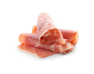 Tasty prosciutto slices on white background