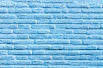 Horizontal blue brick wall background, facade of the house
