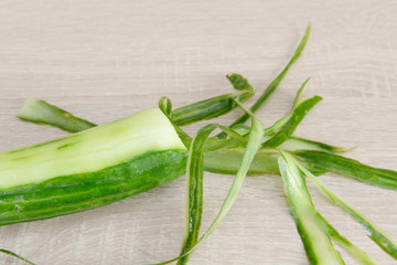 cucumber lying on wood