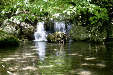 Fototapeta na wymiar nostalgic dream detail of waterfall in Sassinoro