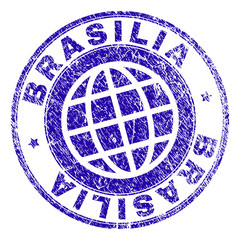 BRASILIA stamp imprint with distress texture. Blue vector rubber seal print of BRASILIA title with scratched texture. Seal has words arranged by circle and globe symbol.