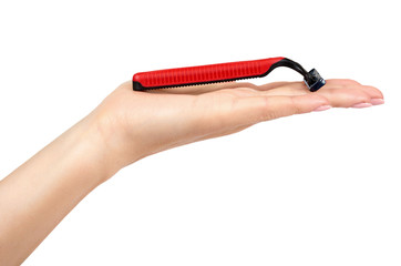 Red disposable shaving razor with hand isolated on white background.