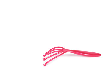 Plastic pink massager for head, isolated on white background ,copy space template
