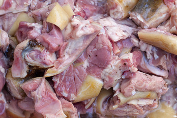 Goat meat is cut into pieces.